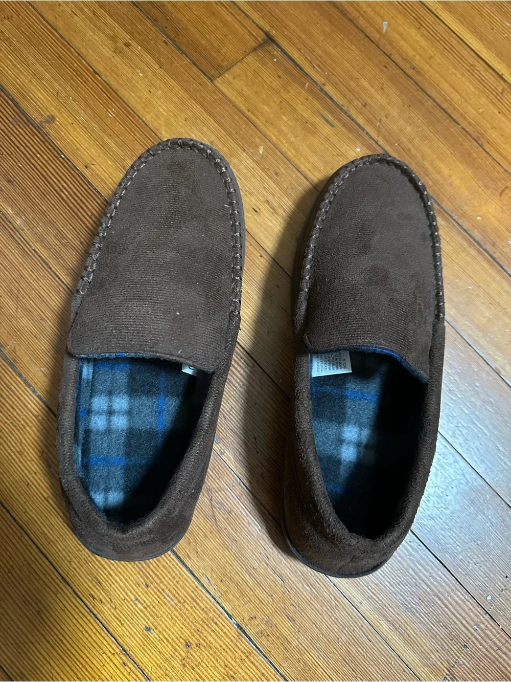Mocassin-style slippers for men.
